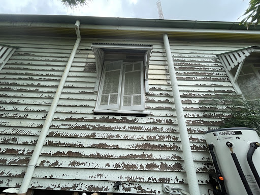 house with localised paint failure lead paint encapsulation